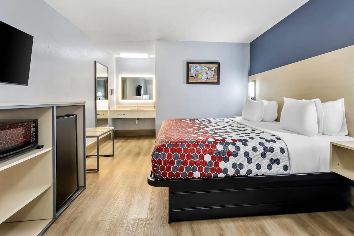 Standard Room, 2 Queen Beds, Non Smoking | Desk, blackout drapes, iron/ironing board, WiFi (free)