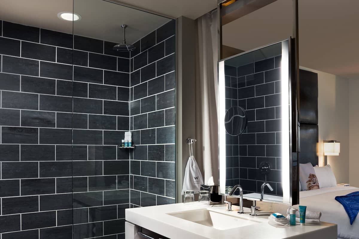 Shower, rainfall showerhead, designer toiletries, hair dryer