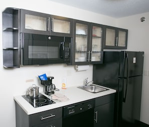 Studio Suite, 2 Double Beds, Accessible Bathtub (Communications, Accessible Tub) | Private kitchen | Full-sized fridge, microwave, stovetop, dishwasher - Candlewood Suites Fargo-N. Dakota State University by IHG (Fargo)