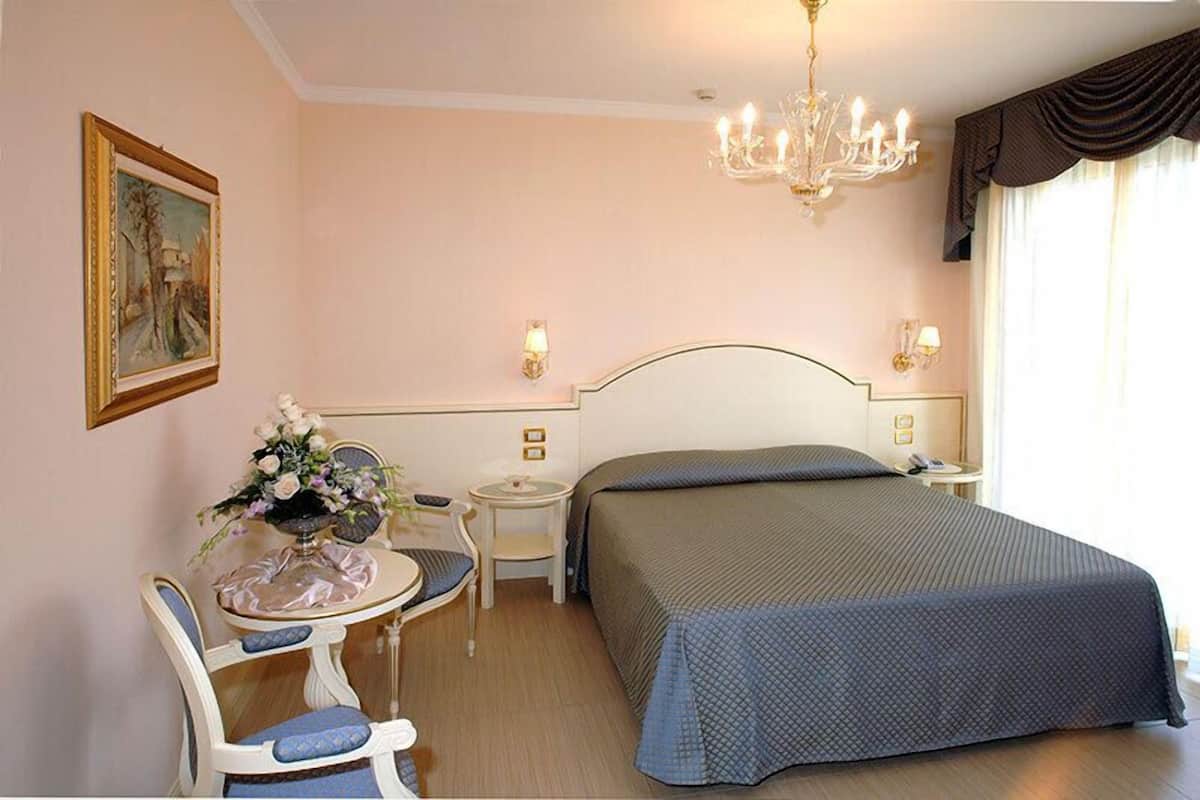 Deluxe Double Room, 1 King Bed | Premium bedding, minibar, in-room safe, individually decorated