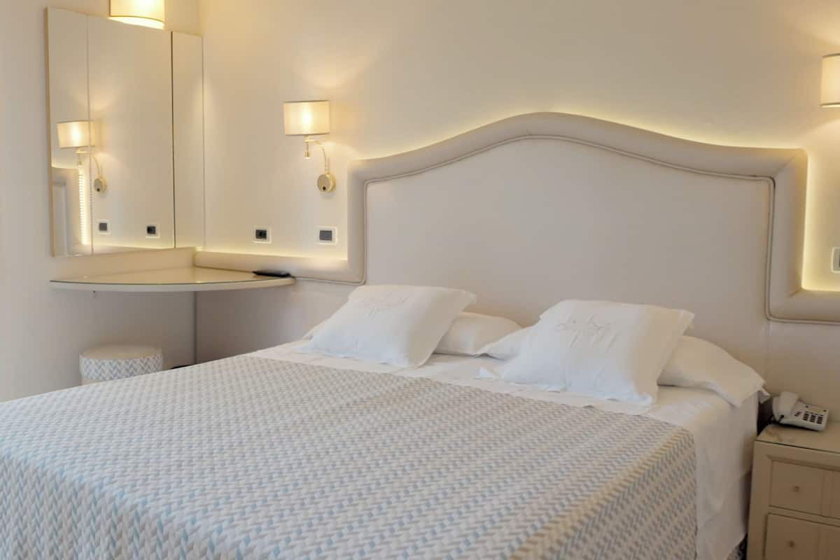Standard Double Room, 1 Queen Bed, Balcony | Premium bedding, minibar, in-room safe, individually decorated