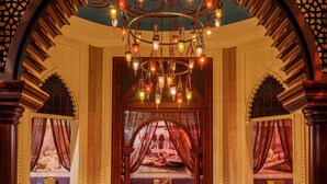 A luxurious interior with a central seating area, ornate ceiling, and patterned floor. - Rixos Premium Bodrum (Bodrum)