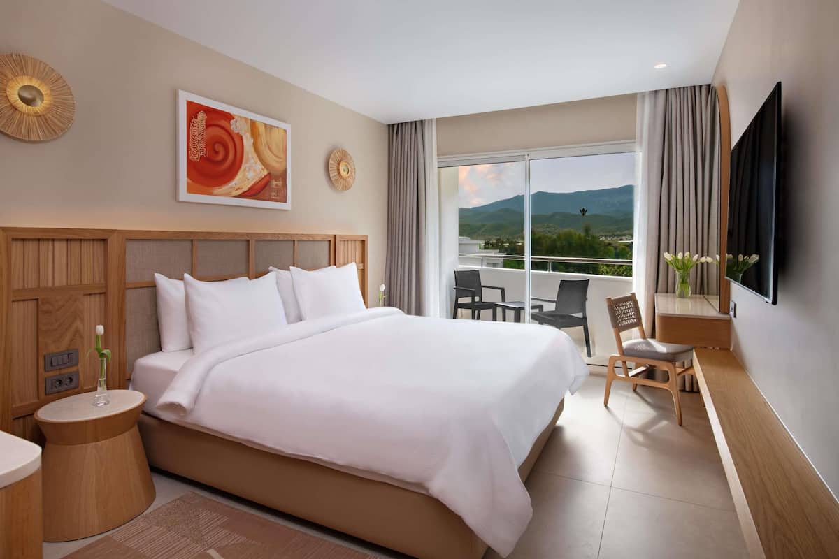 Deluxe Family Suite Garden View | 1 多间卧室、迷你吧(备有免费物品)、客房内保险箱、笔记本电脑工作区