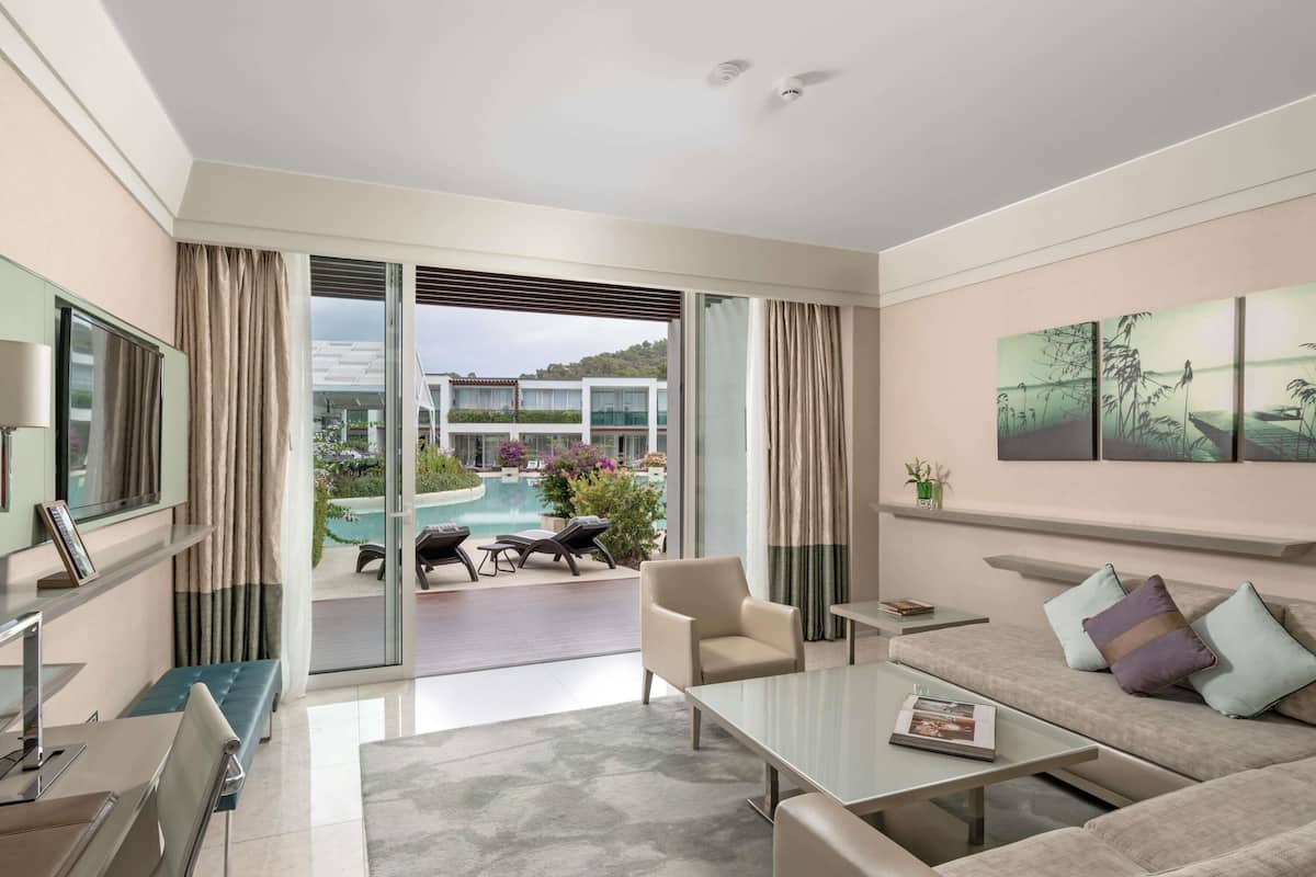 Pool Villa,Pool Access | Minibar (free items), in-room safe, laptop workspace, cribs (free)