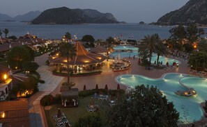 A resort with multiple swimming pools, a central gazebo, and a view of the sea. - Marti Resort Hotel (Marmaris)