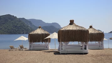 Private beach, beach cabanas, sun loungers, beach umbrellas