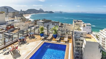 Outdoor pool, open 10 AM to 10 PM, sun loungers