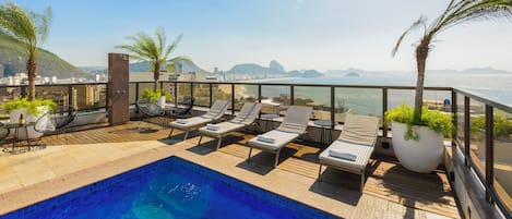 Outdoor pool, open 10 AM to 10 PM, sun loungers