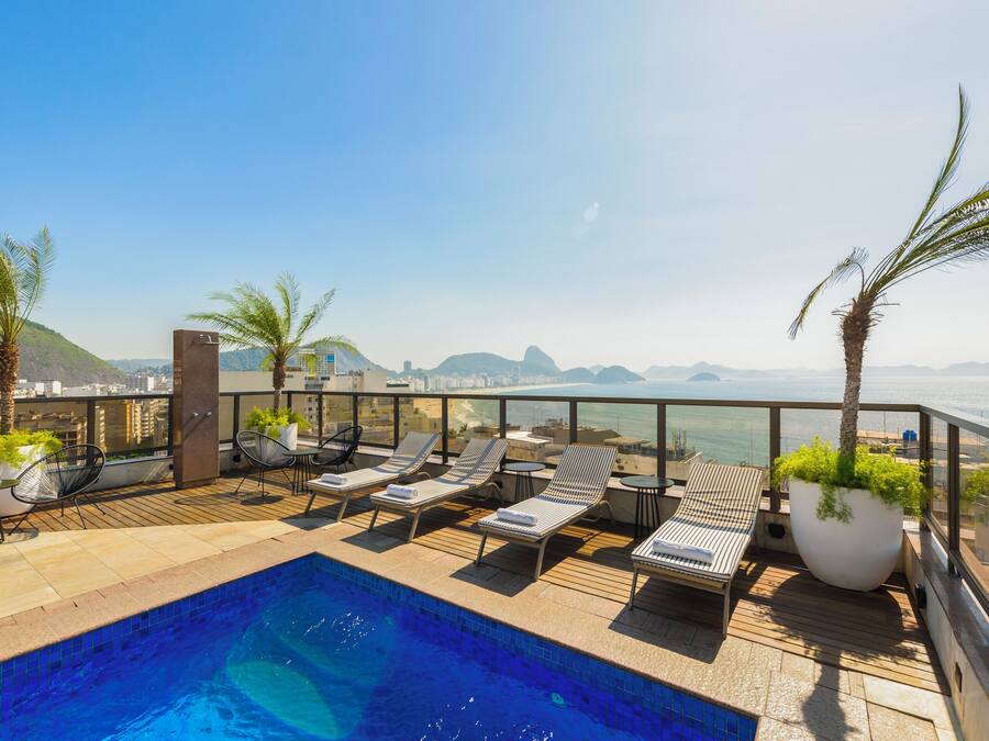 Outdoor pool, open 10 AM to 10 PM, sun loungers