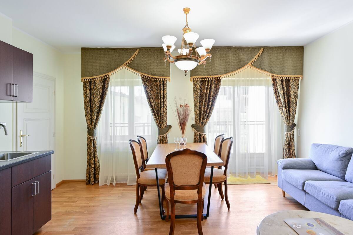 family suite, 3 bedrooms, balcony | living room | 60-cm lcd tv with satellite channels, tv