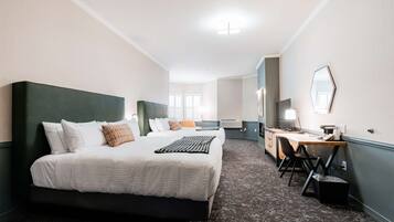 Room, 2 Queen Beds | In-room safe, desk, iron/ironing board, cribs/infant beds