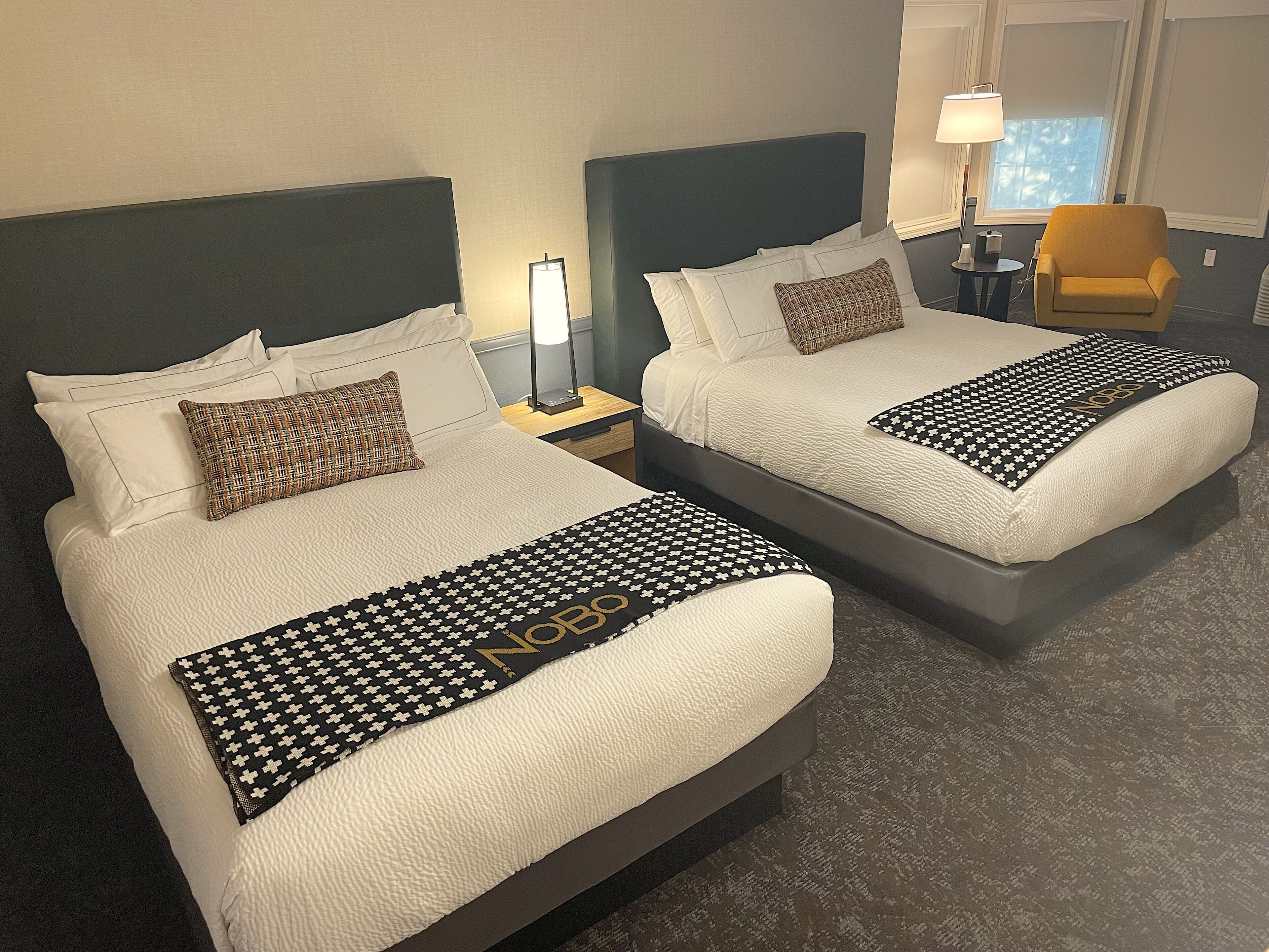 deluxe room, 1 bedroom, fireplace | in-room safe, desk, iron/ironing board, cots/infant beds