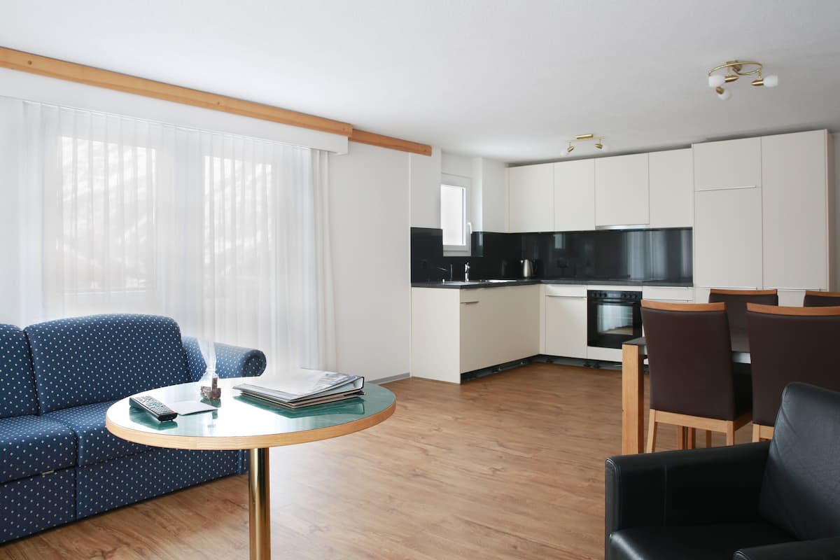 Apartment, 3 Bedrooms, Balcony | Living area | 17-inch flat-screen TV with cable channels, TV