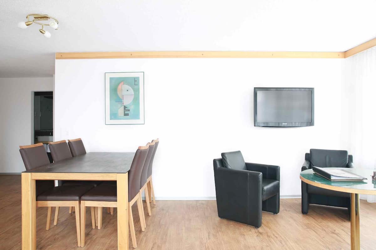 Apartment, 2 Bedrooms | Living area | 17-inch flat-screen TV with cable channels, TV