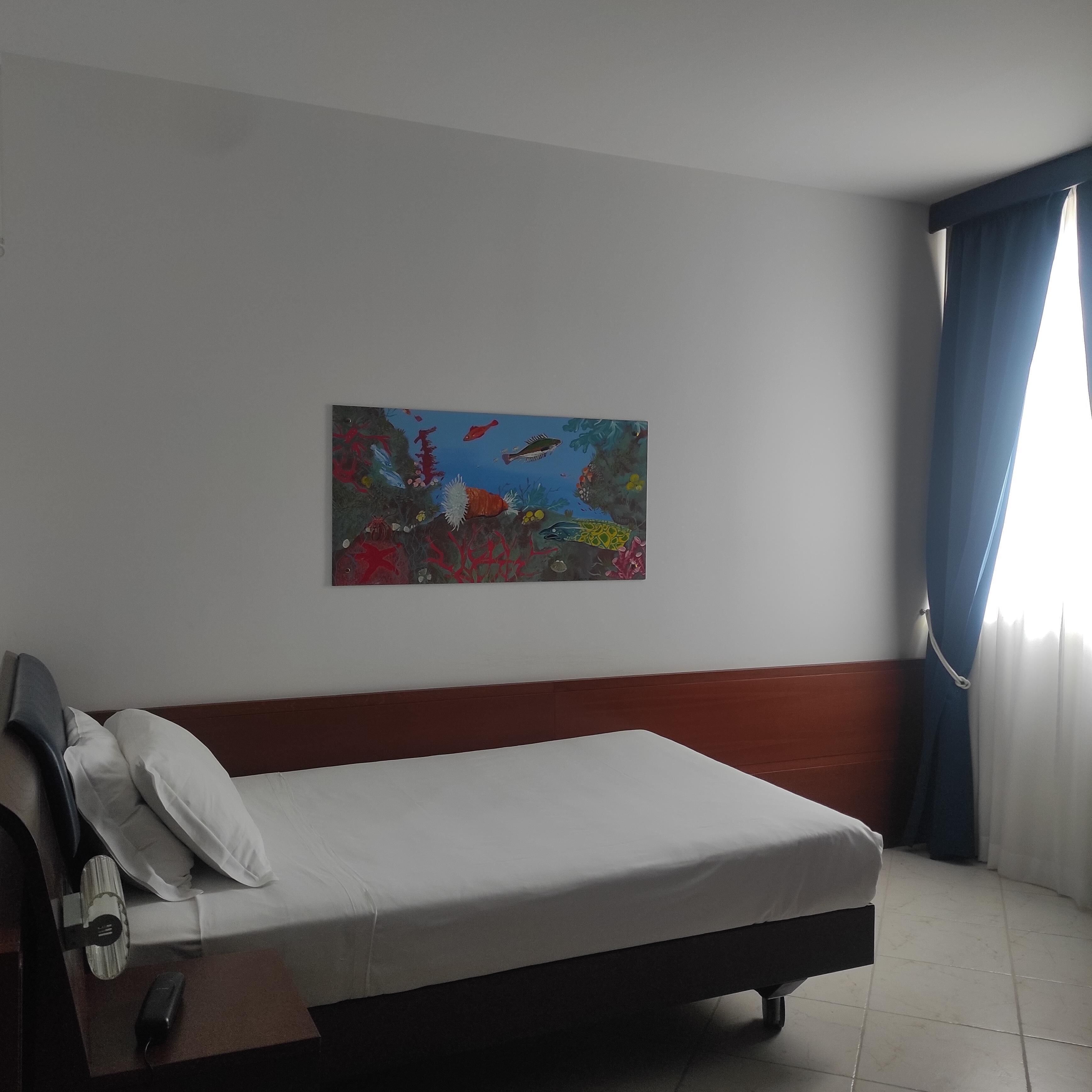 Habitación estándar, 1 cama individual, no fumadores, vistas al mar | Edredones de plumas, minibar, caja fuerte y escritorio