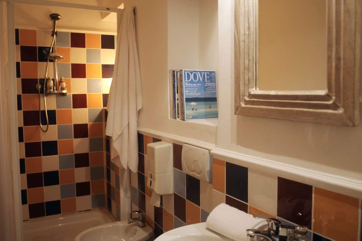 standard room | bathroom | rainfall showerhead, free toiletries, hair dryer, bidet