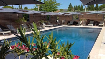Seasonal outdoor pool, pool umbrellas, sun loungers