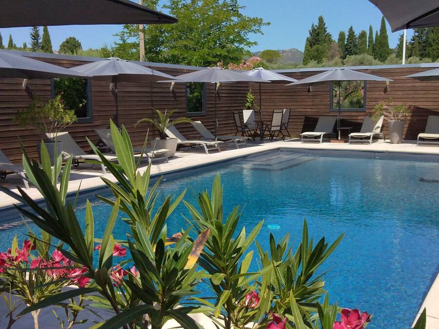 Seasonal outdoor pool, pool umbrellas, pool loungers