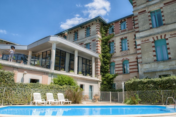 Seasonal outdoor pool, open 11:00 AM to 6:00 PM, sun loungers