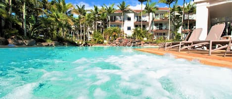 2 outdoor pools, a heated pool, open 6:30 AM to 9:30 AM, pool umbrellas