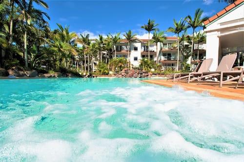 2 outdoor pools, a heated pool, open 6:30 AM to 9:30 AM, pool umbrellas