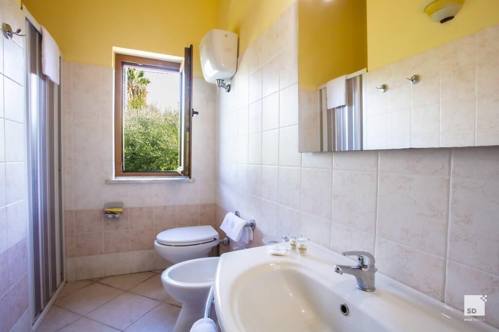 standard room, pool view (family) | bathroom | shower, free toiletries, slippers, bidet