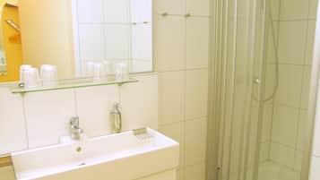 Shower, free toiletries, hair dryer, towels