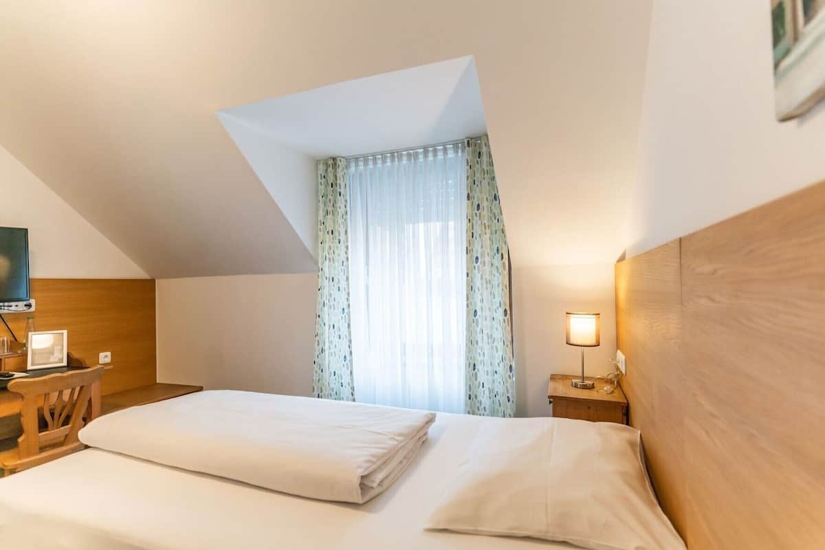 Desk, blackout curtains, iron/ironing board (on request), free WiFi