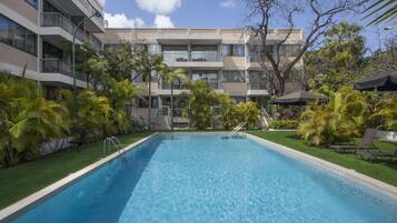 Outdoor pool, open 9 AM to 7 PM, pool umbrellas, sun loungers