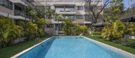 Outdoor pool, open 9 AM to 7 PM, pool umbrellas, sun loungers