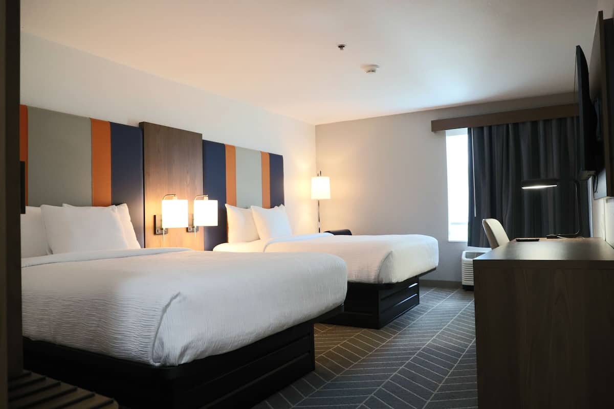 Standard Room, 2 Queen Beds | Desk, iron/ironing board, cribs (free), WiFi (free)