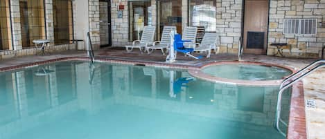 Indoor pool, open 10:00 AM to 10:00 PM, pool loungers