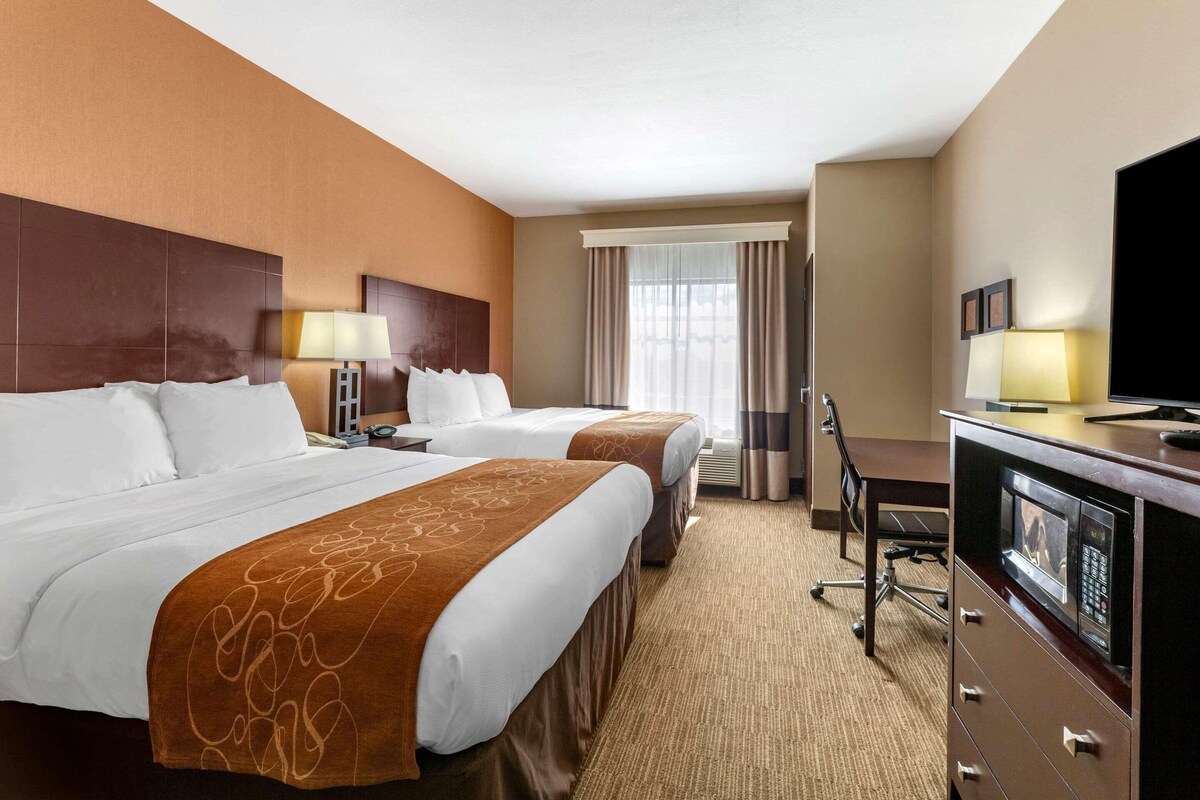 Premium bedding, pillow-top beds, desk, blackout curtains