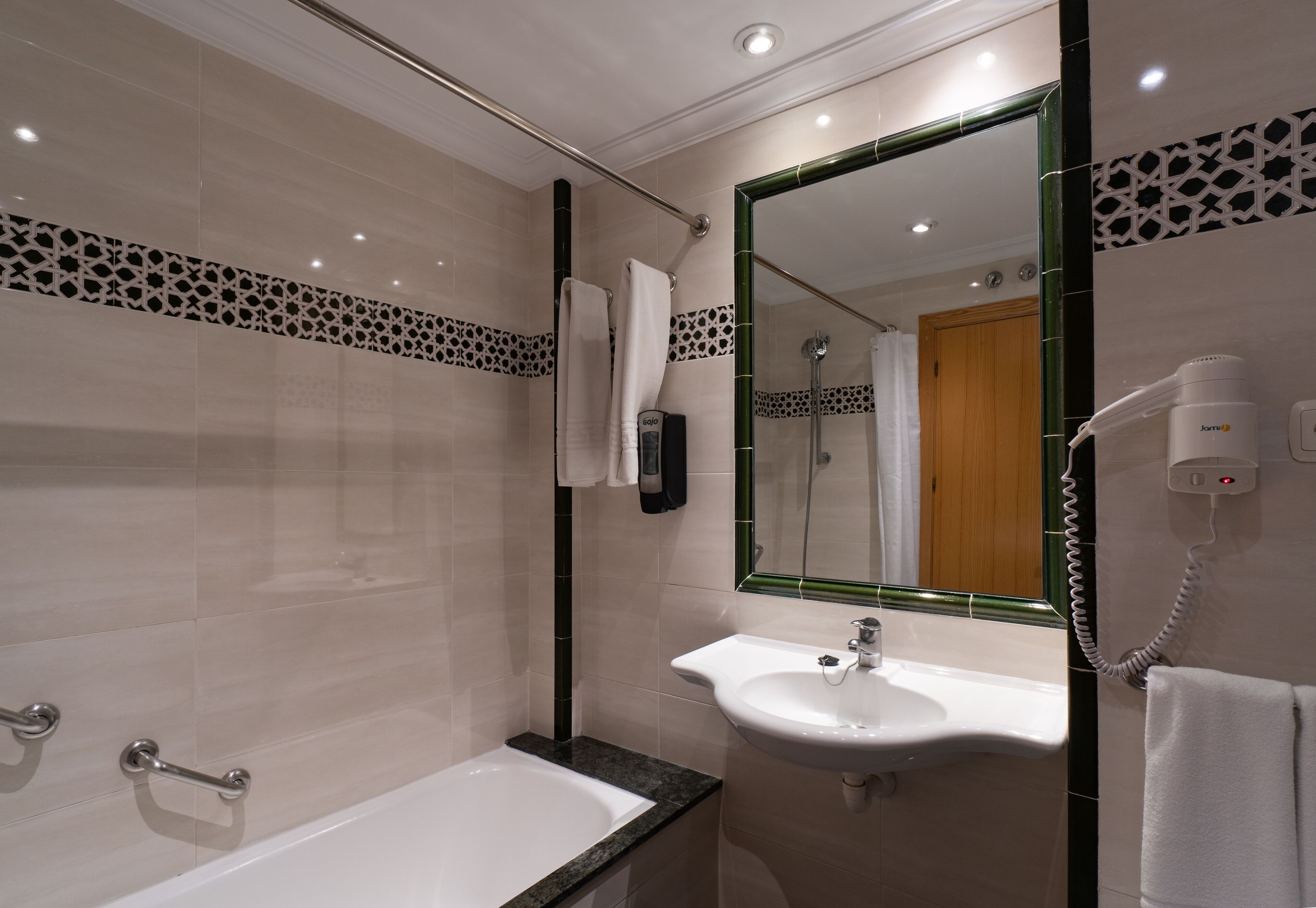 free toiletries, hair dryer, bidet, towels