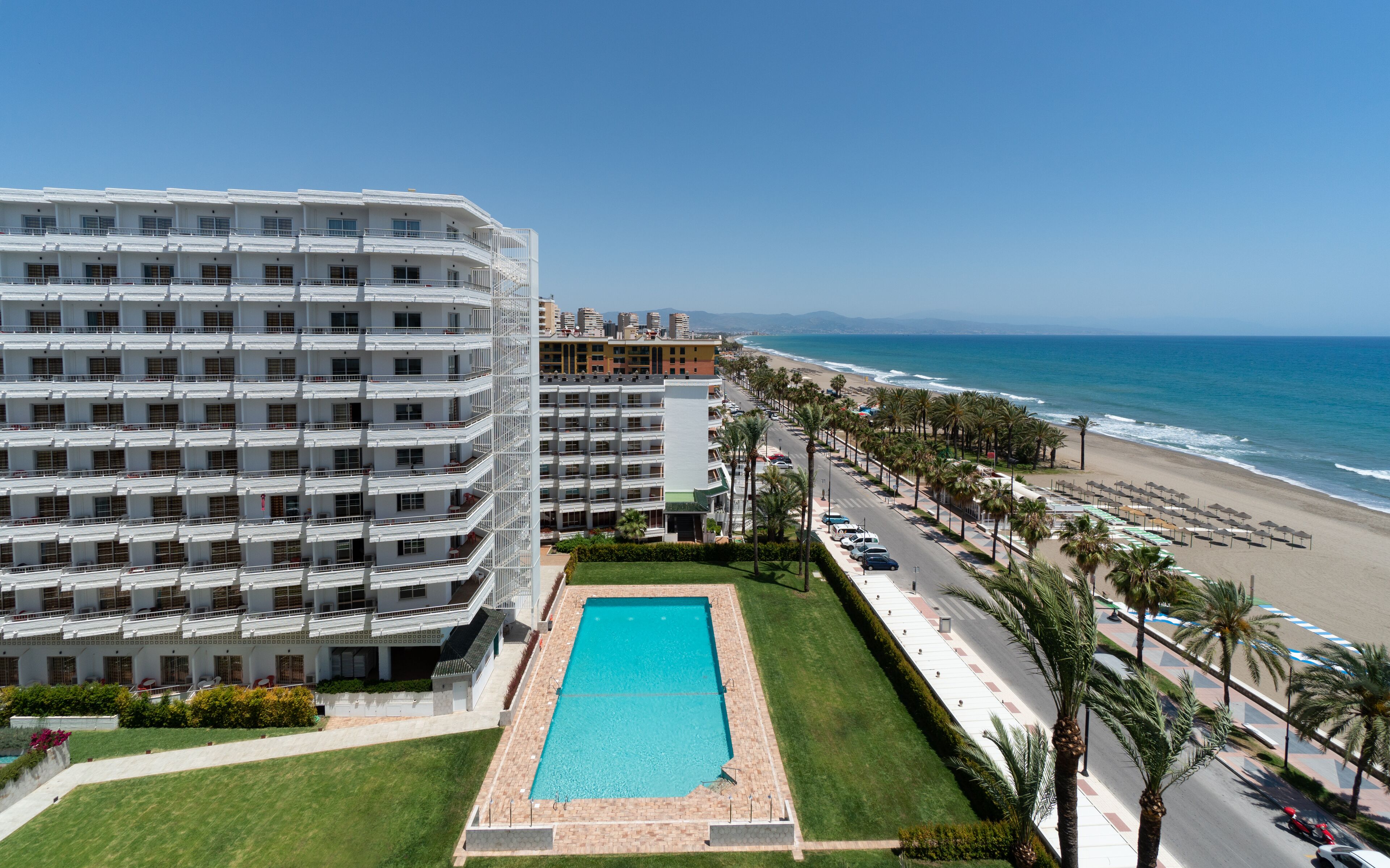 outdoor pool, pool umbrellas, pool loungers