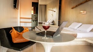 Superior Room | Minibar, in-room safe, desk, laptop workspace