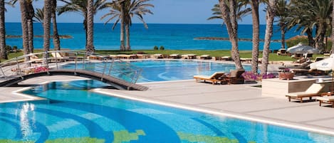 Indoor pool, 2 outdoor pools, pool umbrellas, pool loungers