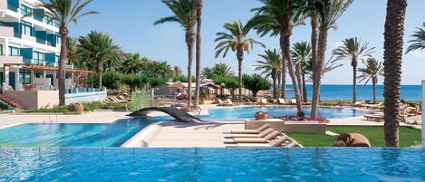 Indoor pool, 2 outdoor pools, pool umbrellas, pool loungers