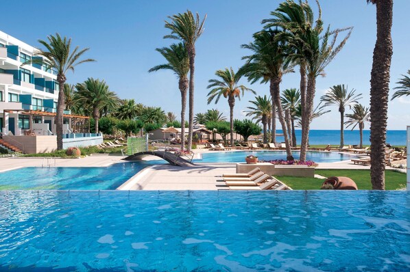 Indoor pool, 2 outdoor pools, pool umbrellas, pool loungers
