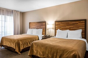 Desk, laptop workspace, blackout drapes, iron/ironing board