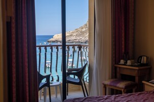 Habitación estándar, vistas al mar | Ropa de cama hipoalergénica, caja fuerte, escritorio y cortinas opacas