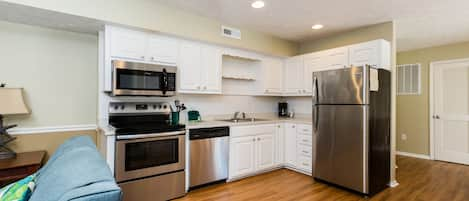 Condo, 3 Bedrooms | Private kitchen | Fridge, microwave, dishwasher, coffee/tea maker