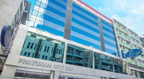 The exterior of Pratunam City Inn, featuring a modern glass facade and a prominent sign. - Pratunam City Inn (Bangkok)