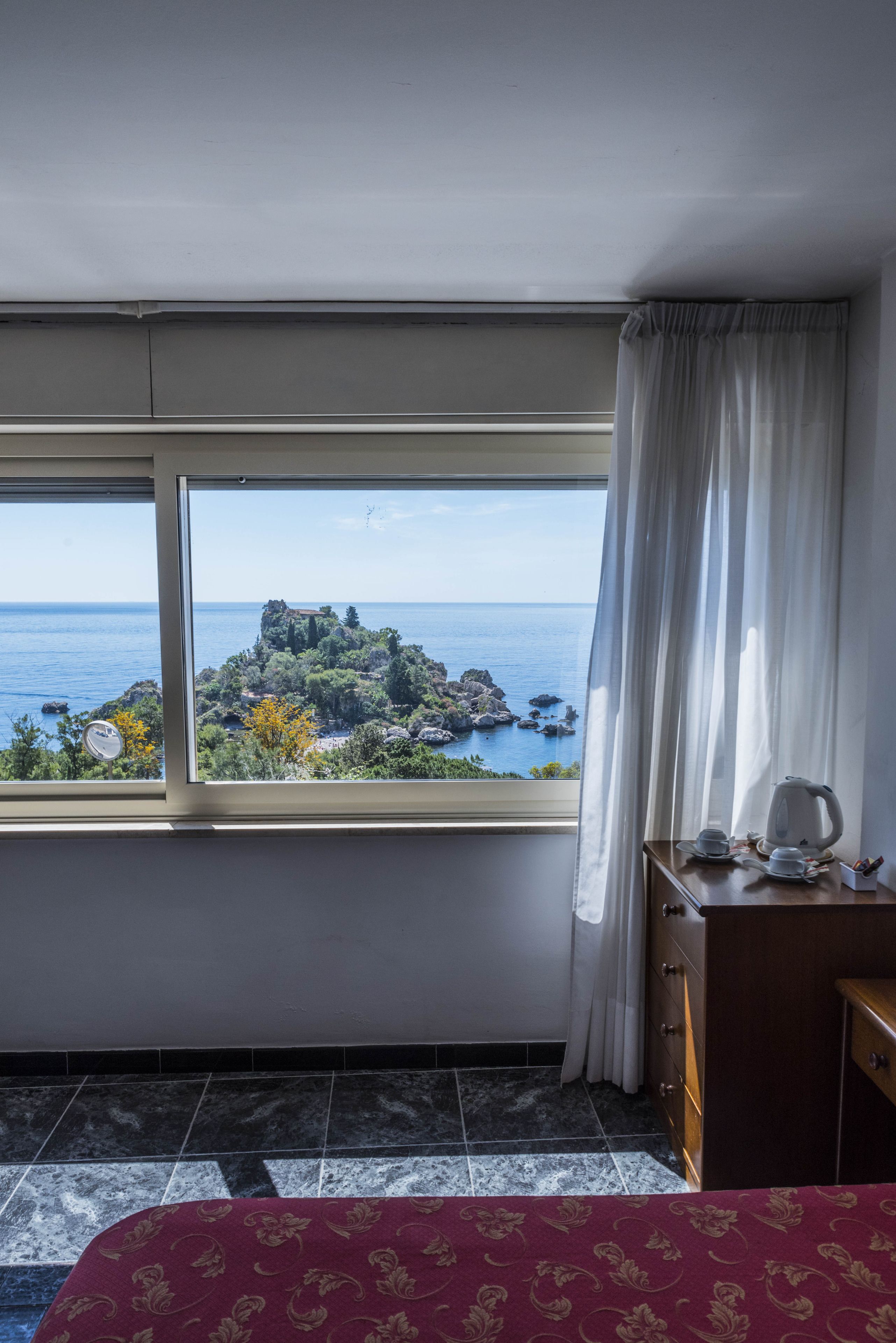 Economy Double Room, Ground Floor | Minibar, in-room safe, desk, free WiFi