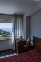 Economy Double Room, Ground Floor | Minibar, in-room safe, desk, free WiFi