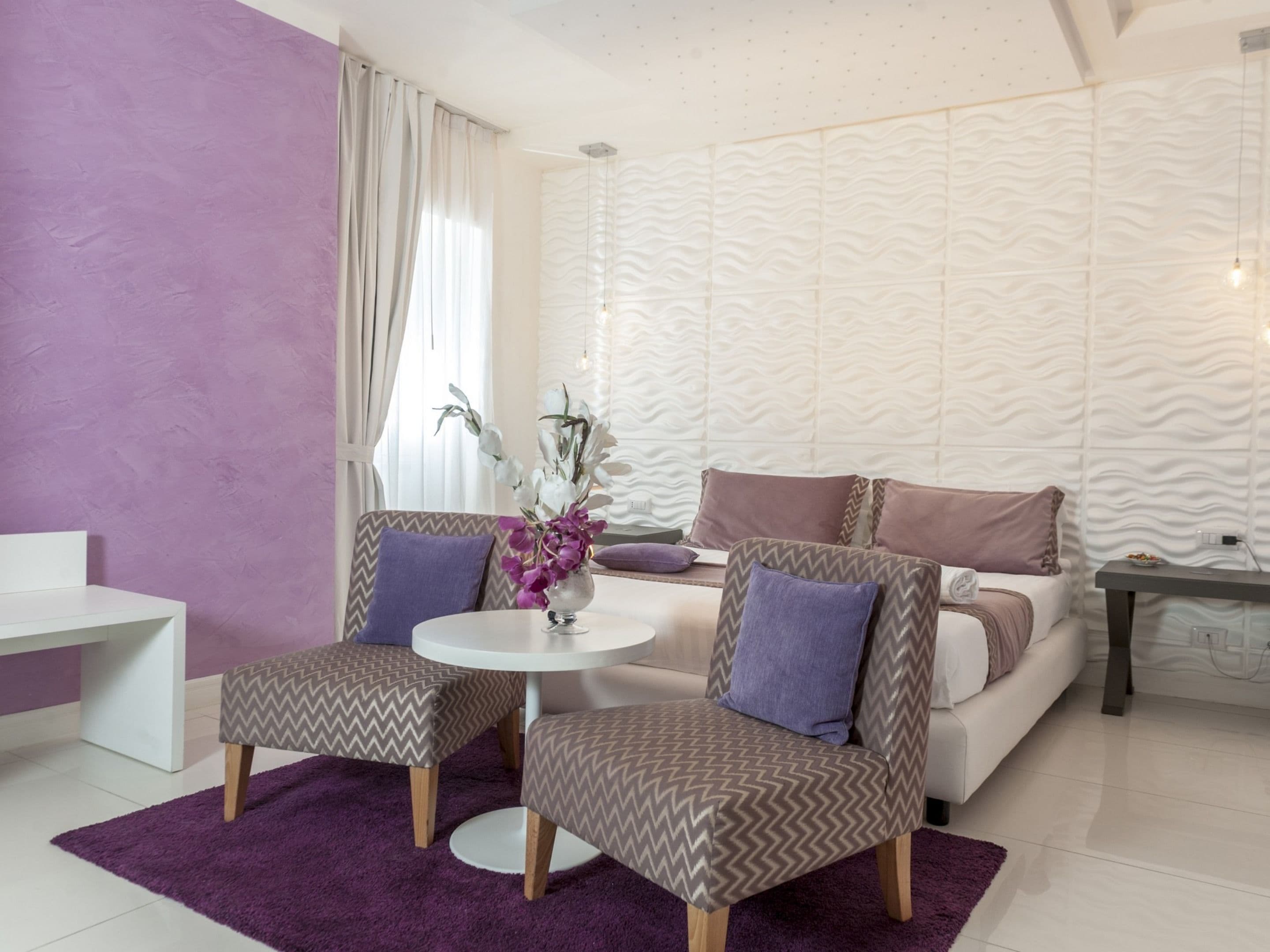 Suite Junior | Minibar, una cassaforte in camera, una scrivania, tende oscuranti