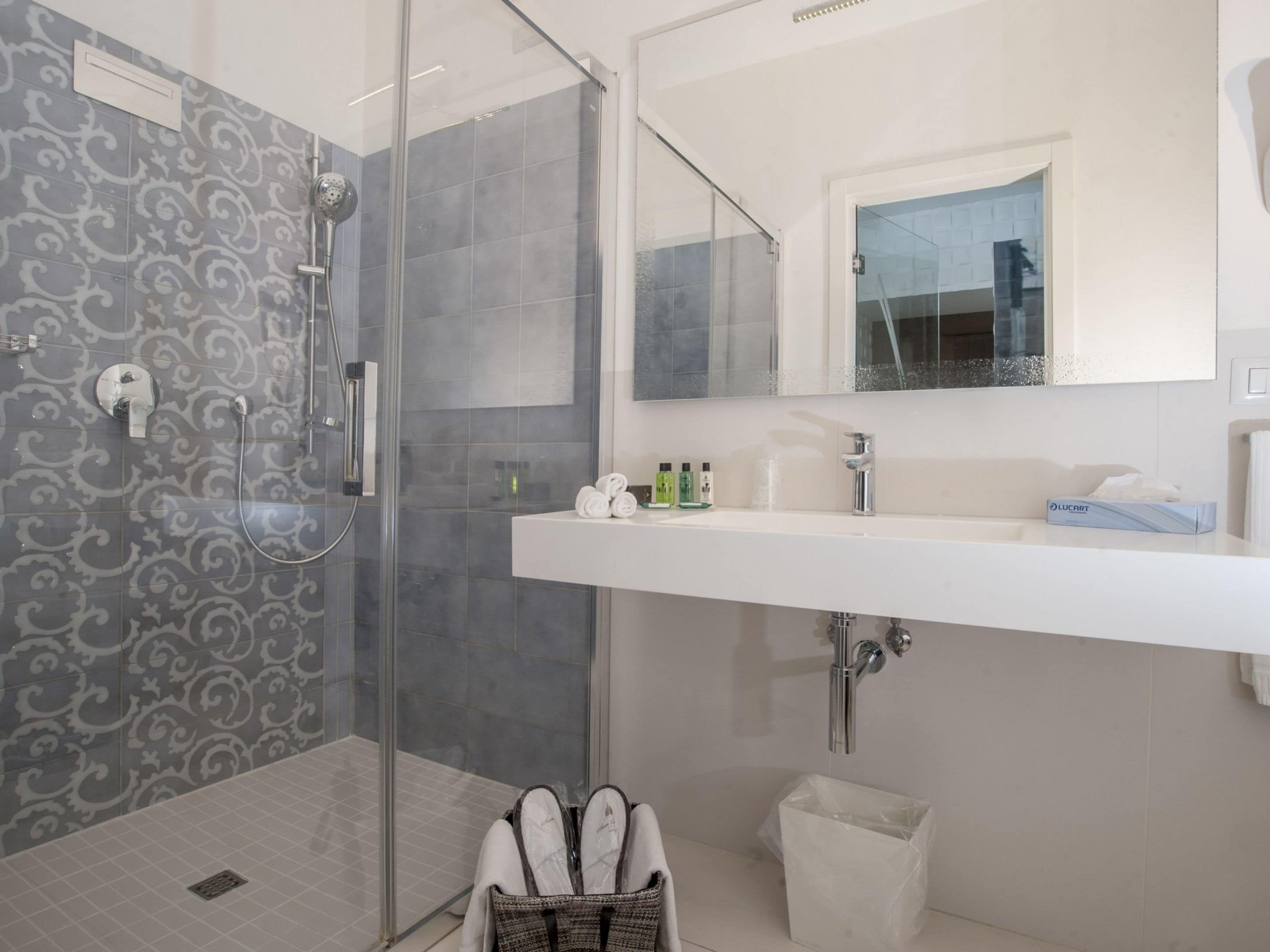 deluxe double room | bathroom | shower, designer toiletries, hair dryer, bidet