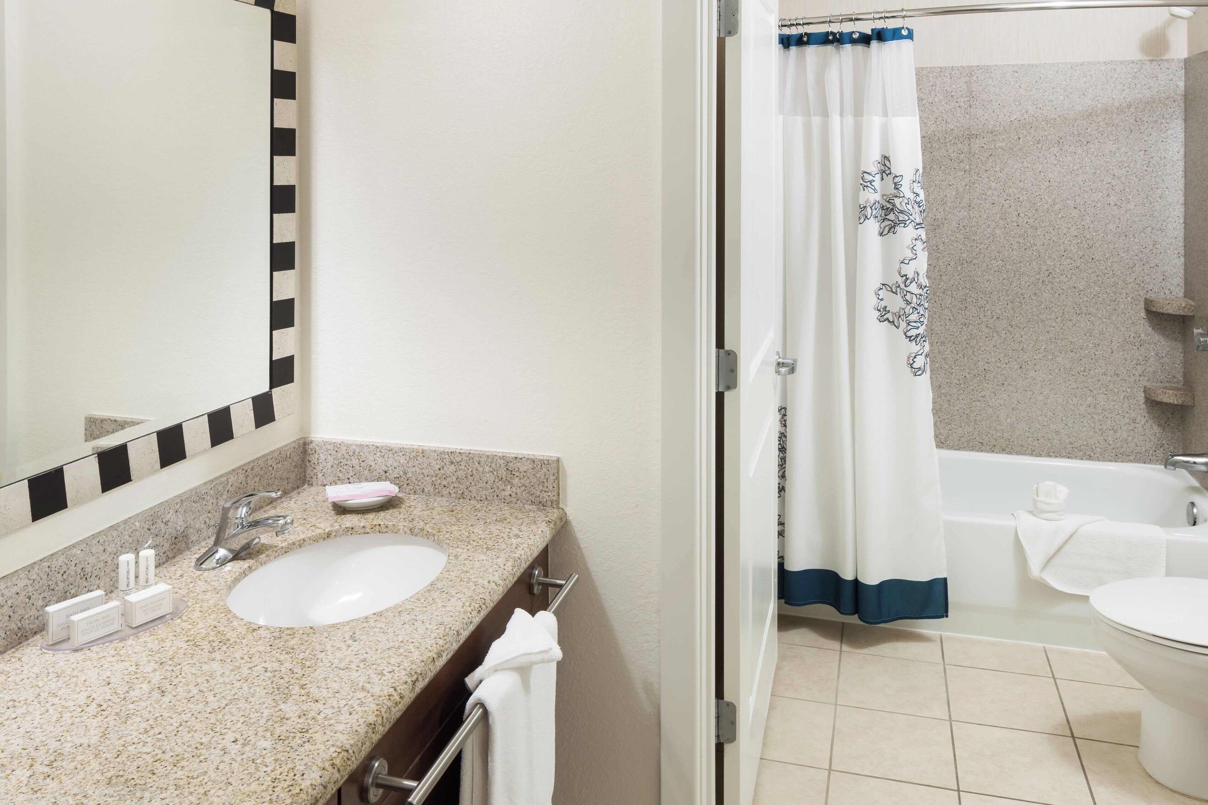 combined shower/bathtub, free toiletries, hair dryer, towels