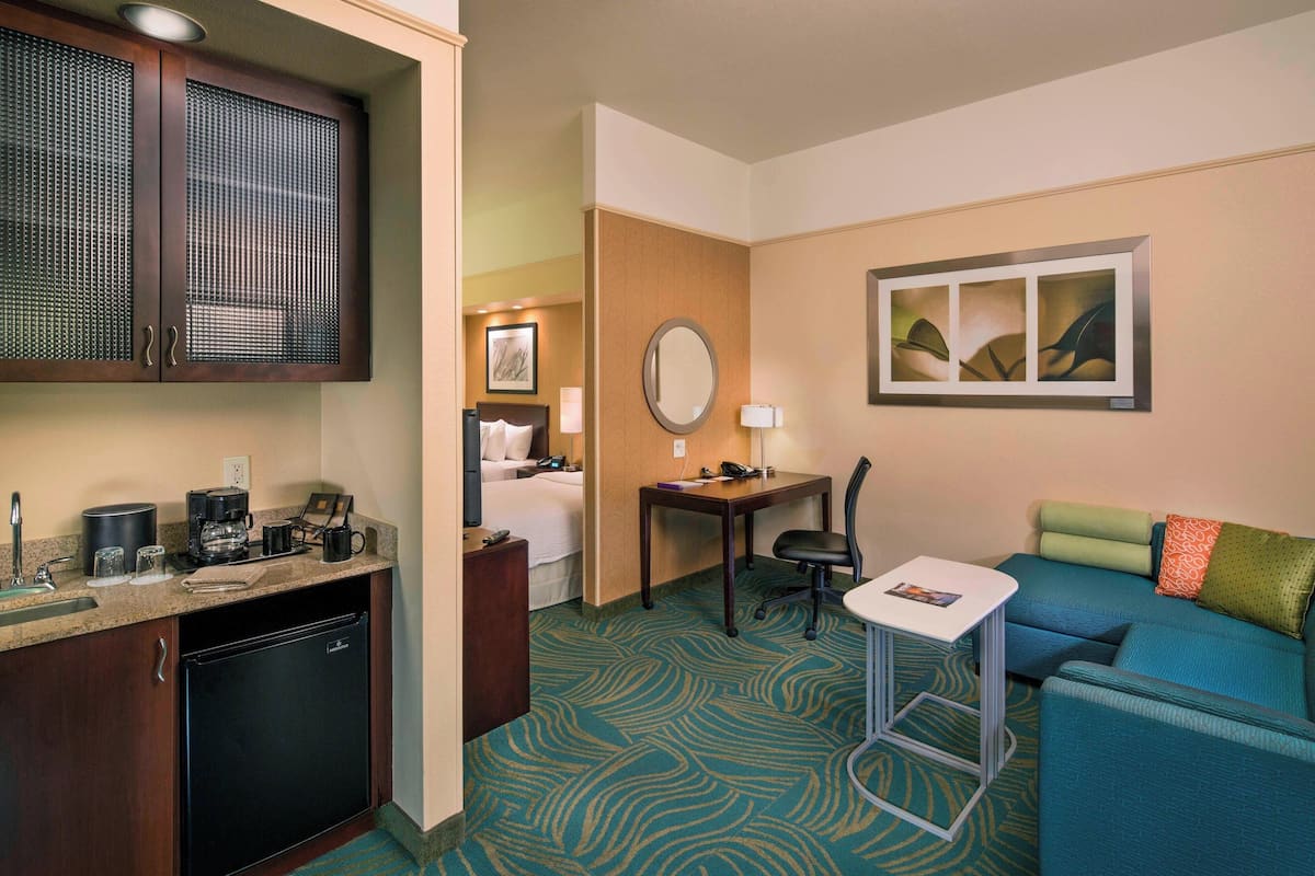 suite, 2 double beds | living room | flat-screen tv, pay films