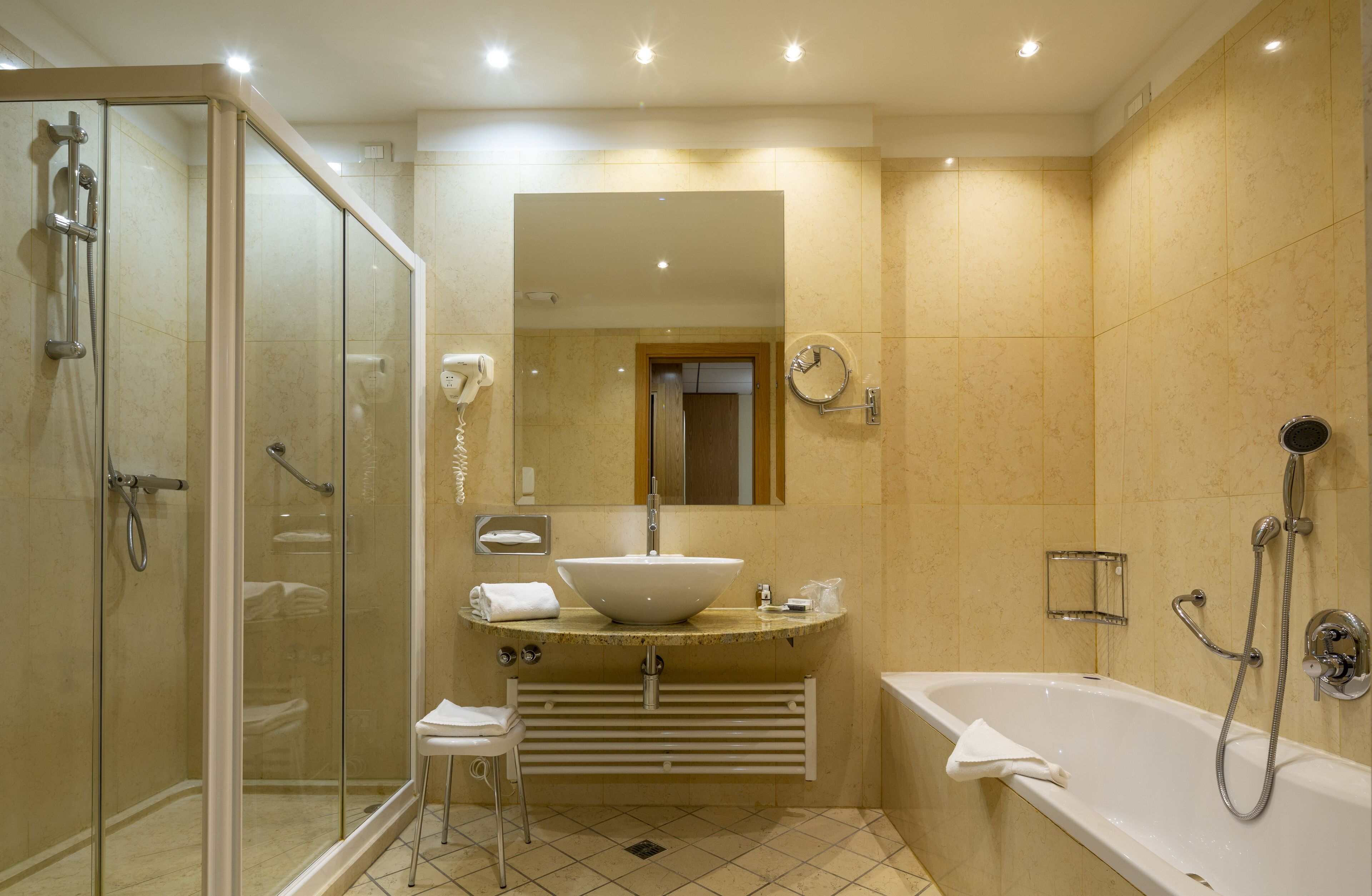 suite, 1 king bed (living area) | bathroom | combined shower/bathtub, hair dryer, bathrobes, bidet